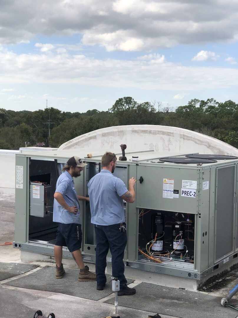 Custom Air Online working on a commercial HVAC installation Custom Air Online working on a commercial HVAC installation